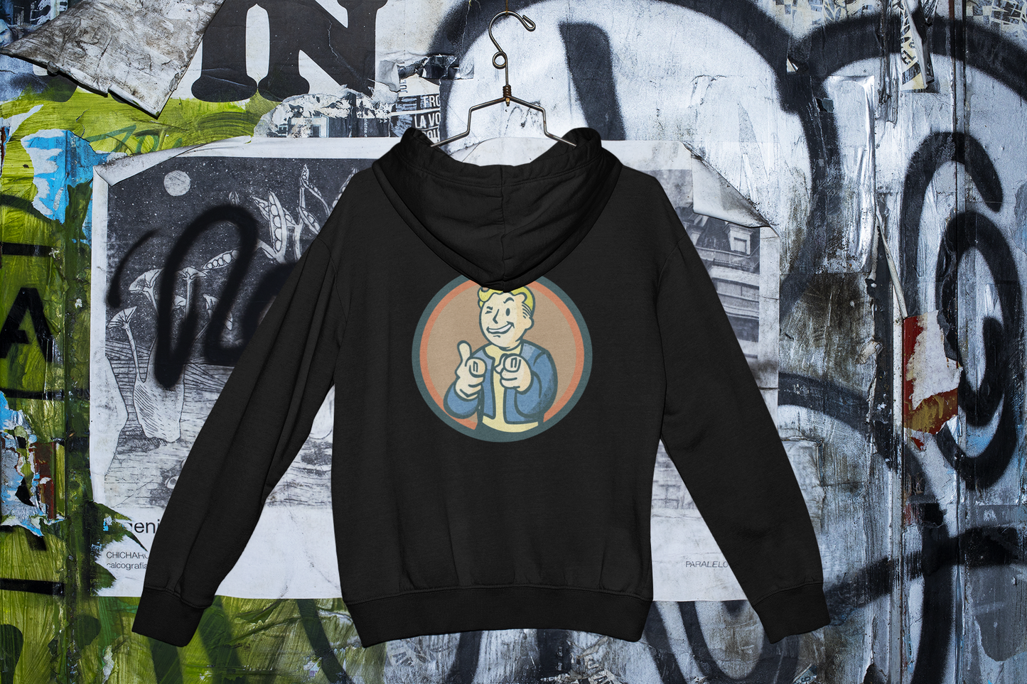 Nuka Cola Nuka Girl Vintage Pin up on the front with Nuka Boy Finger Guns on the back Unisex Hoodie